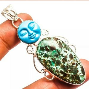 New Chrysocola Carved Blue Face Silver Pendant.
